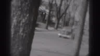 Harrisburg Pennsylvania USA (1975): Car Driving Away Man In Suit Walking Down