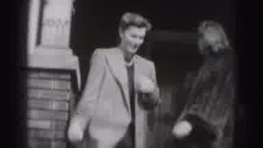 Harrisburg Pennsylvania USA (1975): Two Women Leaving Building Are Then Joined By