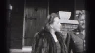 Harrisburg Pennsylvania USA (1975): A Couple Walking Forward Down The Staircase