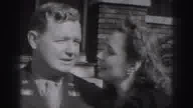 Harrisburg Pennsylvania USA (1975): Sweetheart Kisses Soldier On The Cheek While A