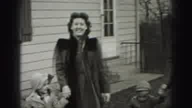 HARRISBURG PENNSYLVANIA USA-1975: Man Woman Walking With Children On Clear