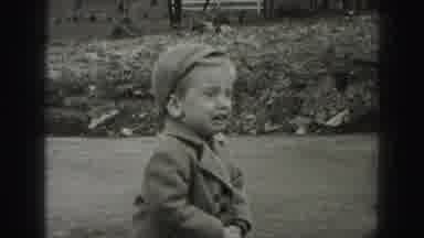Harrisburg Pennsylvania USA (1975): Little Boy Crying Outside And His Mother Comes
