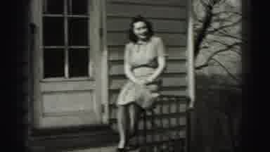 Harrisburg Pennsylvania USA (1975): A Lady Sitting On Her Porch Waving Bye To Her