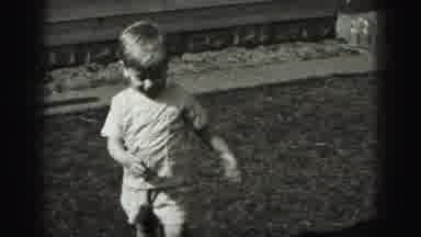 Harrisburg Pennsylvania USA (1975): That Baby Happens And That Kid Plays Happily