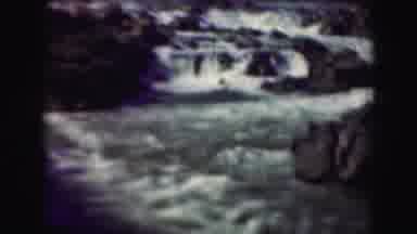 Washington DC (1975): A Waterfall Flowing Down A River And People Looking On