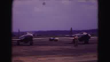 Washington DC (1975): Camera Pans From Right To Left Across Tarmac At Airport
