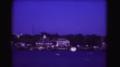 Washington DC (1975): A Person Fastly Ride The Boat On The Ocean