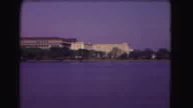 Washington DC (1975): A Coloured Video Of A River Which Has Buildings And A