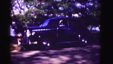 Washington DC (1975): 1940s Or 1950s Automobile Parked In Shade On Side Of Road In