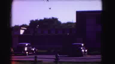 Washington DC (1975): Vintage Cars Parked In Front Of White And Brown Buildings On