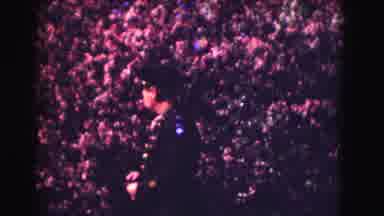 Washington DC (1975): Woman Waiting On The Sidewalk In A Red Jacket Followed By