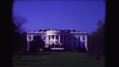 Washington DC (1975): A Man And Woman Strolling By Washington Monuments On A Sunny