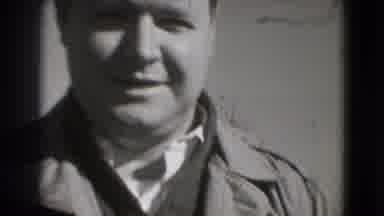 WASHINGTON DC-1975: Man Smiles At Camera As Woman Walks Away