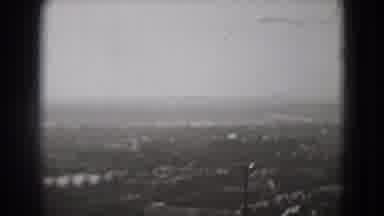 Washington DC (1975): Aerial View Of City Buildings And Trees On A Cloudy Day