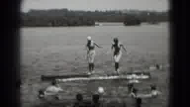 Washington DC (1975): Two Women Dressed In Bathing Suits Play On A Log In A Body