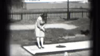 Washington DC (1975): Mature Lady And Man In Suit Play Mini Golf Together Old