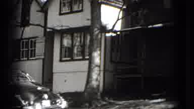 Washington DC (1975): A Picture Of An Old Antique Car And Old Brick House