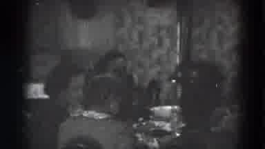 Lincoln Nebraska (1975): Black And White Shot Of Women Sitting Down Having A Meal