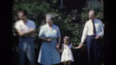 Middletown Pennsylvania (1975): A Happy Family Talking To Each Other Standing