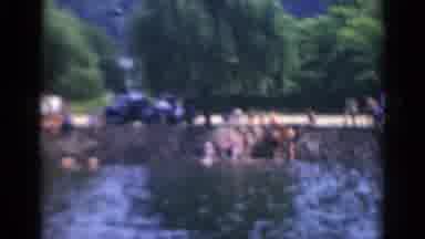 Middletown Pennsylvania (1975): Men Wearing Brown And Blue Swim Trunks Jumping