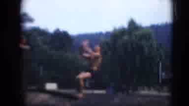 Middletown Pennsylvania (1975): People Diving Into A Swimming Pool