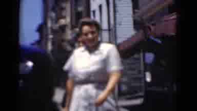 Middletown Pennsylvania (1975): Two Women Walk In The Side Next To A Black Car In