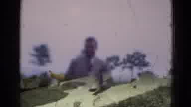 Middletown Pennsylvania (1975): A Man And A Young Child Walking On A Sidewalk