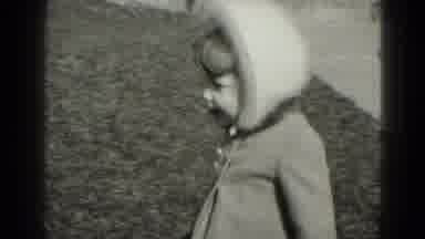 Middletown Pennsylvania (1975): Happy Child Dressed In Winter Clothes Runs Around