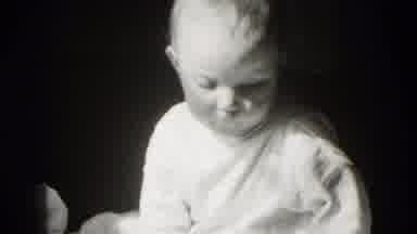 Middletown Pennsylvania (1975): A Cute Boy Is Busy With Something In His Home