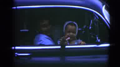 Middletown Pennsylvania (1975): Parents Driving In A Car With Baby Girl Waving