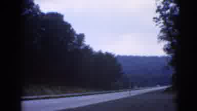 Middletown Pennsylvania (1975): A Car Drives Down The Road While Being Filmed From