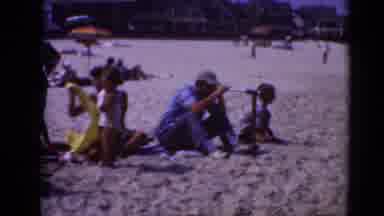 Middletown Pennsylvania (1975): Ladies With Kids Lay On The Beach Under The Sun