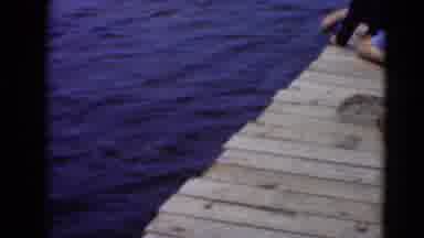 Middletown Pennsylvania (1975): A Dad And His Child Are Fishing With Fishing Line