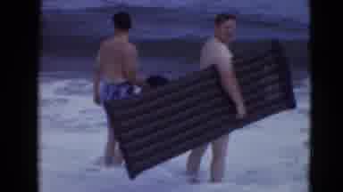 Middletown Pennsylvania (1975): A Family Of Three Playing At The Beach Standing In