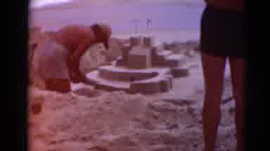 Middletown Pennsylvania (1975): Men And Women Build Sand Castles And Swim In The