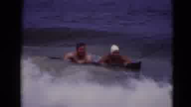 Middletown Pennsylvania (1975): Two Individuals Getting Swept Off Boogie Board By