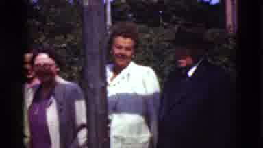 Denmark (1975): Windy Day Group Standing And Conversing Outside By Street Corner
