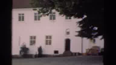 Denmark (1975): Camera Pans Across A Very Large White Historic Looking House