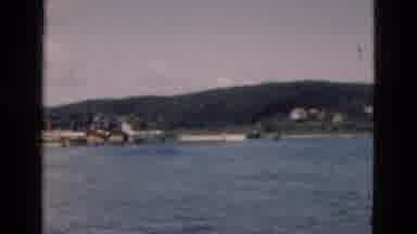 Denmark (1975): Water View Showing Buildings On Shore And Along Coast With Hills