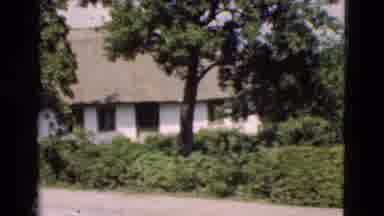 Denmark (1975): Suburb Trees People Bikes Open Road Fields Blue Sky Grass