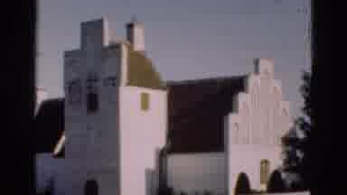 Denmark (1975): The Big Building Look Like It Is A Church With Tree In Front Of It