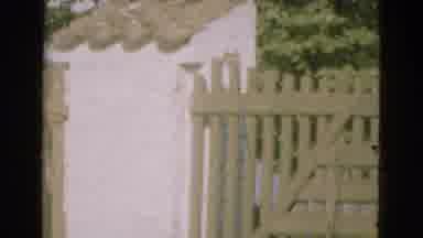 Denmark (1975): A Coloured Video Of A Wooden Fence Near In A Sunny Day