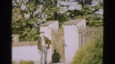 Denmark (1975): Someone Coming From The Entrance Is Carrying Something