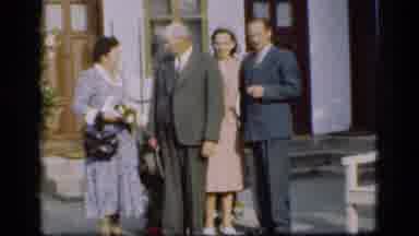Denmark (1975): A View Of A Field And People Dressed Up For A Special Event