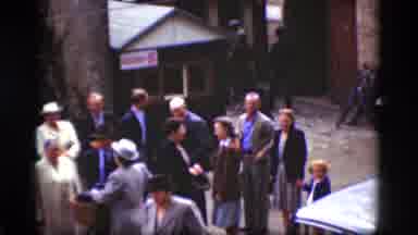 Denmark (1975): A Group Of People Hanging Out In Their Town