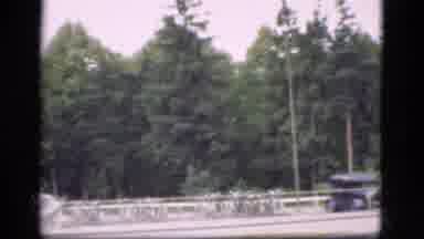 Denmark (1975): Scenic And Urban Landscape Shots Featuring A Car And Building
