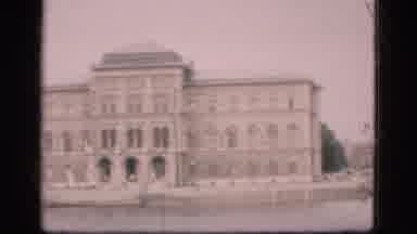 Denmark (1975): A Soldier Marches A Pathway In Front Of A Building