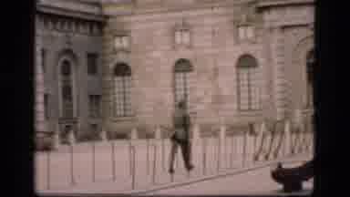 Denmark (1975): A Soldier Walks Over A Building Built By The River