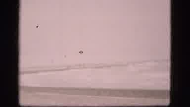 Denmark (1975): Windy Day With Strong Water Waves Hitting The Shore At The Beach
