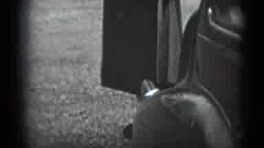 Middletown Pennsylvania (1975): Smiling Pregnant Woman In Black Dress Stands Near